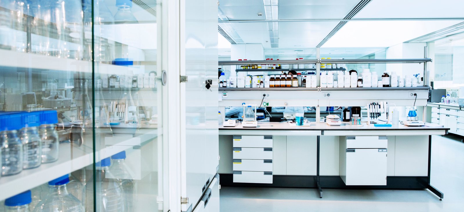 Light-filled laboratory workspace with instruments